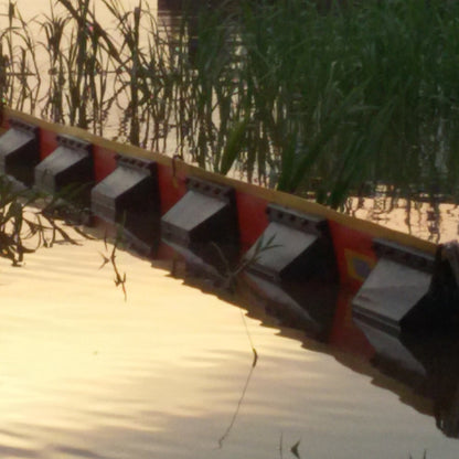 Barrera flotante tipo valla por metro.